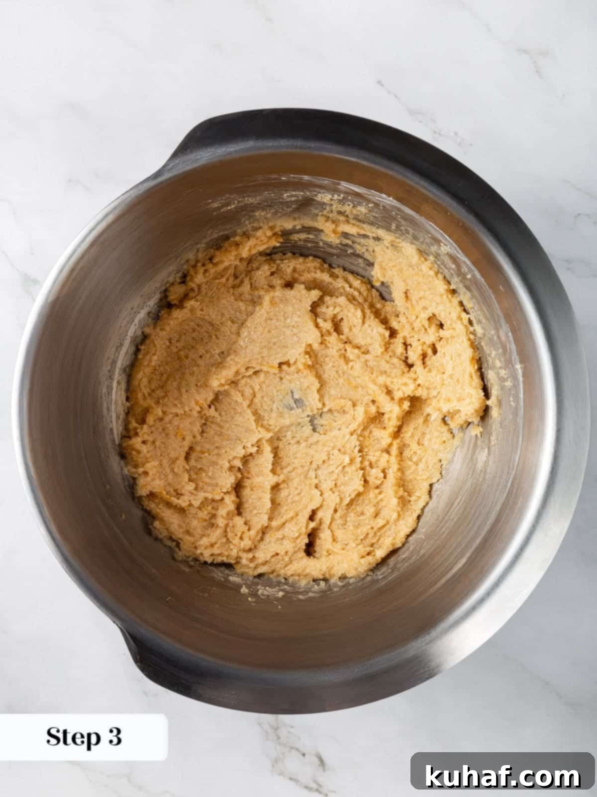 Cherry Chocolate Chunk Cookies 7 Butter and brown sugar being creamed together in a mixing bowl.