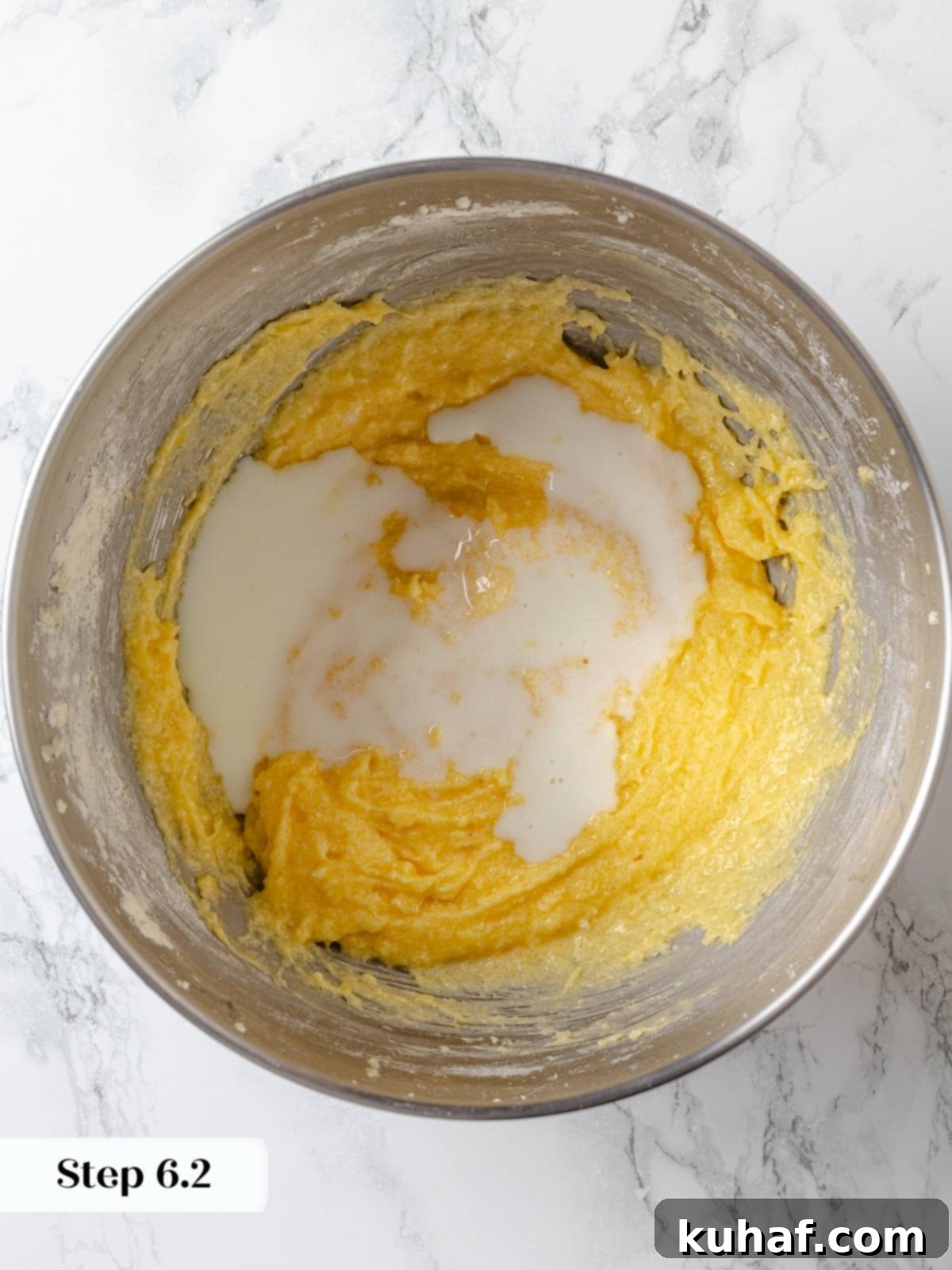 Buttermilk and lemon juice added to cake batter during mixing stage.