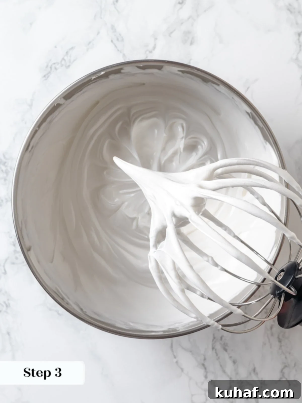 Swiss meringue whipping in stand mixer.
