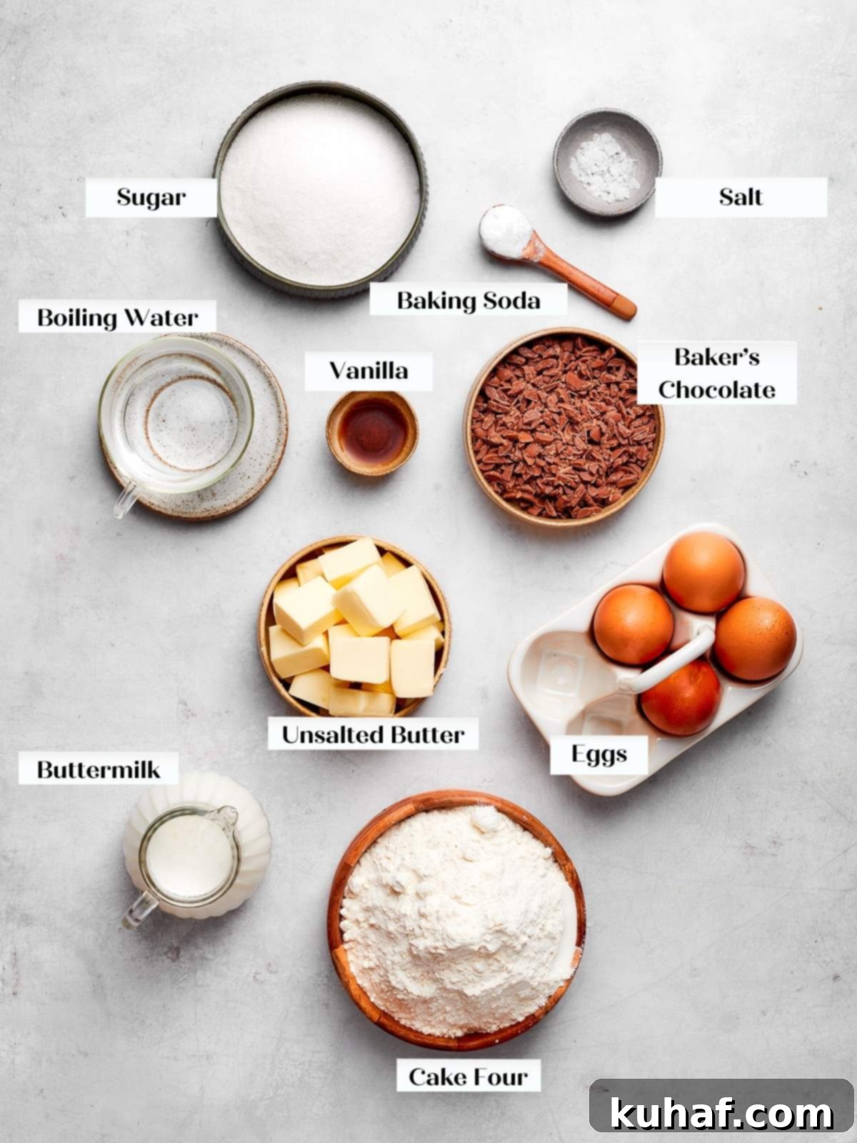 German chocolate cake ingredients arranged on a clean white countertop.