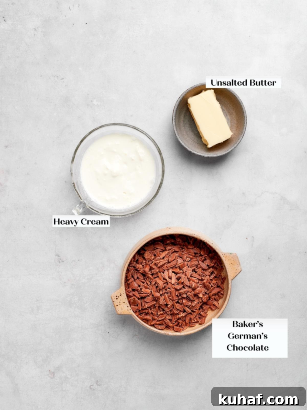 Ingredients for german chocolate cake ganache showcased on a white countertop.