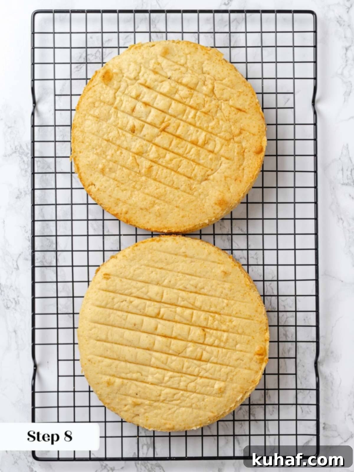 Peanut Butter Dream Cake 13 Freshly baked peanut butter cake layers cooling on wire racks.