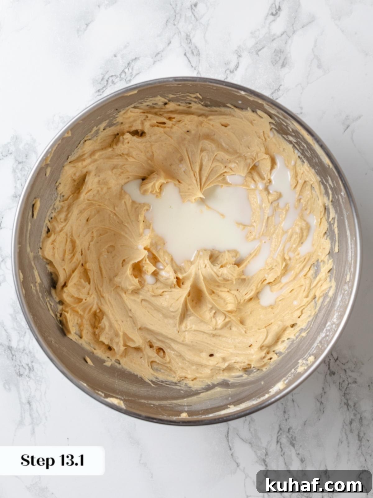 Peanut Butter Dream Cake 18 Cold heavy cream poured into frosting before whipping light and fluffy.