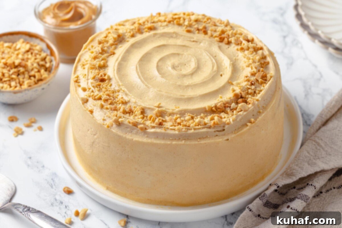 Peanut Butter Dream Cake 5 Light, fluffy peanut butter frosting spread on peanut butter layer cake.