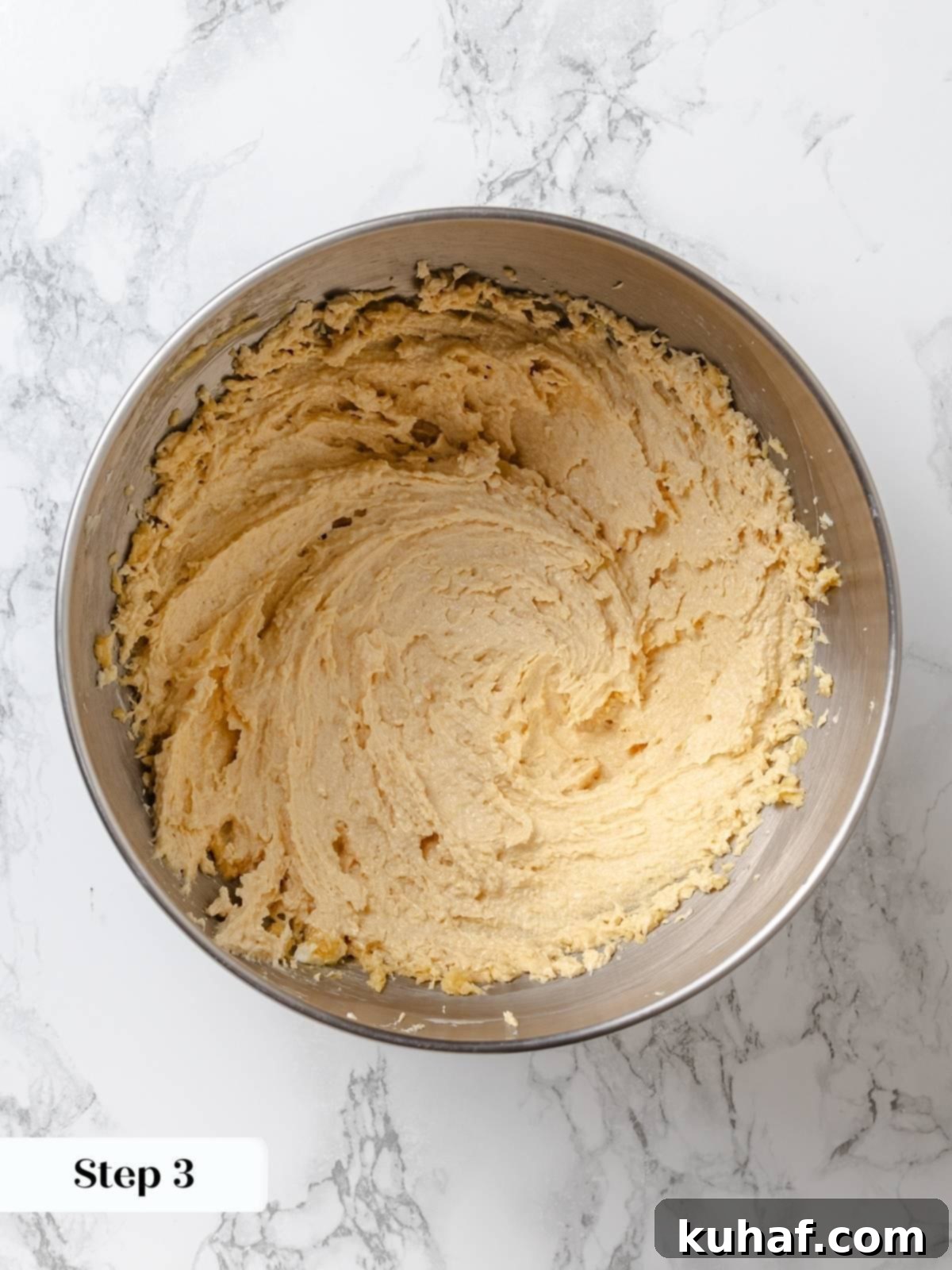 Peanut Butter Dream Cake 7 Butter, peanut butter, and sugar creamed until light and fluffy.