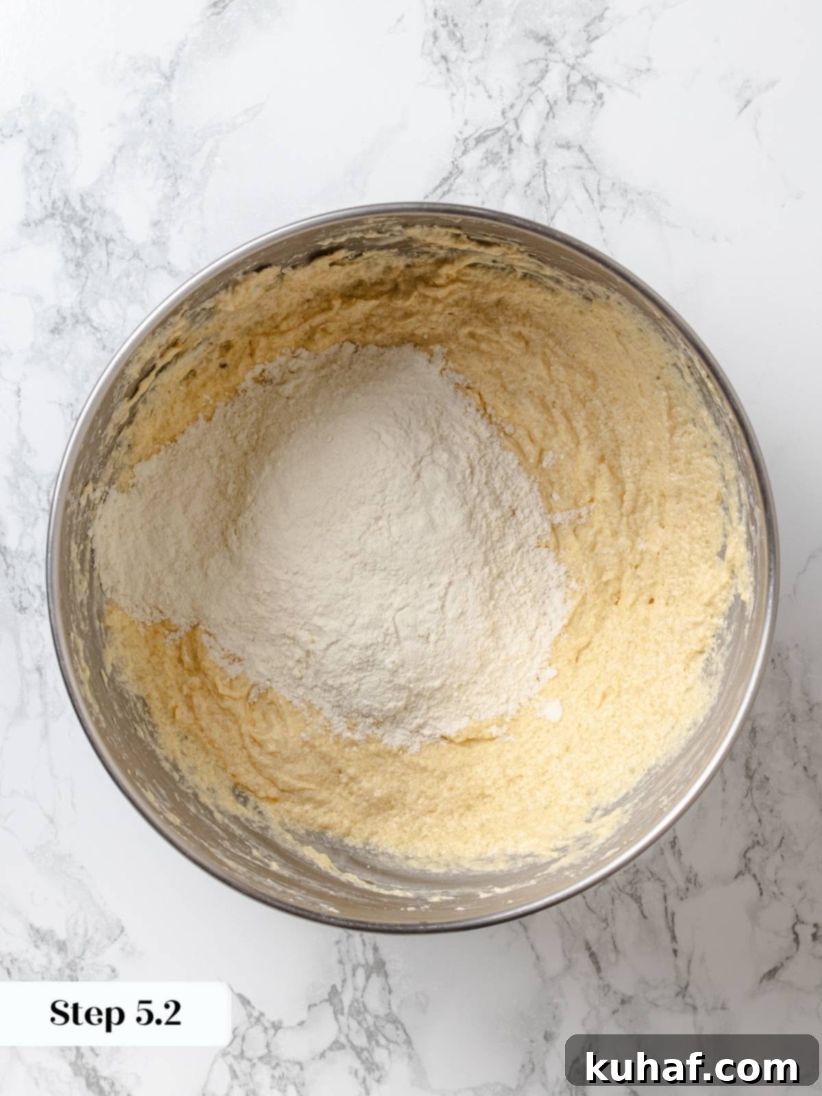 Peanut Butter Dream Cake 10 Cake flour added in stages to peanut butter batter.