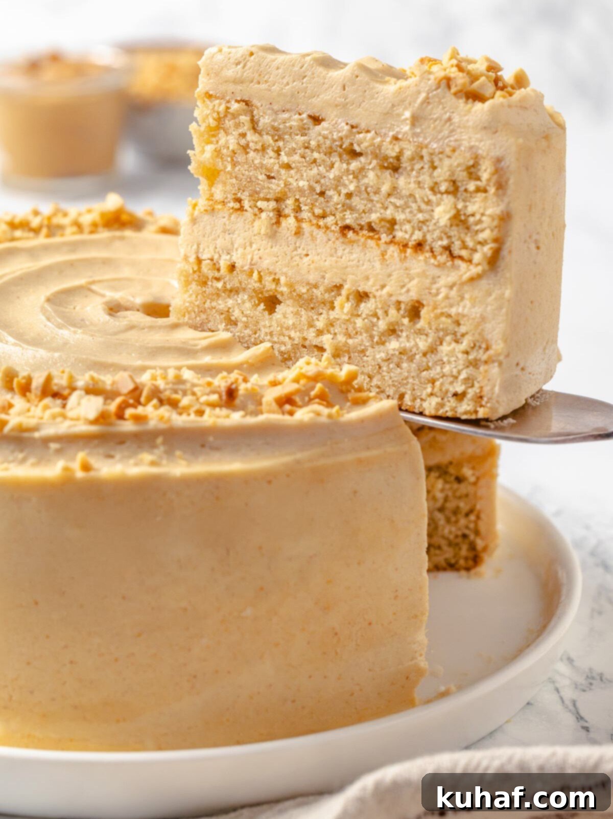 A thick and tempting layer of peanut butter buttercream spread between layers of rich chocolate cake.